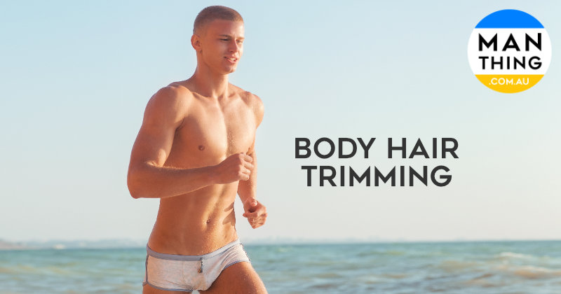 Hairy man trimming his chest hair with electric trimmer